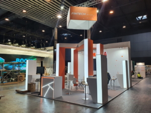 Sleek custom exhibition stand for international technology trade show, designed by ProjeKta to maximize brand visibility and engagement.