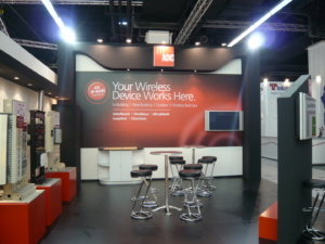 Trade show fair stand for ADC_at_Mobile_World_Congress by ProjeKta -Stand design & in-house production- 🥇 Custom exhibition stand for ADC_at_Mobile_World_Congress, produced by ProjeKta stand builders with innovative branding and structure.