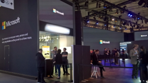 🥇 Custom exhibition stand for Microsoft_at_Mobile_World_Congress, produced by ProjeKta stand builders with innovative branding and structure.