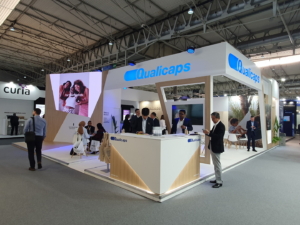 🥇 Custom exhibition stand for Qualicaps_at_CPHI_2023, produced by ProjeKta stand builders with innovative branding and structure.