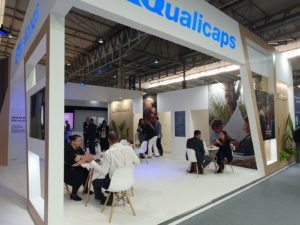 🥇 Custom exhibition stand for Qualicaps_at_CPHI_2023, produced by ProjeKta stand builders with innovative branding and structure.