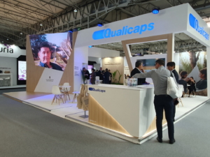 🥇 Custom exhibition stand for Qualicaps_at_CPHI_2023, produced by ProjeKta stand builders with innovative branding and structure.