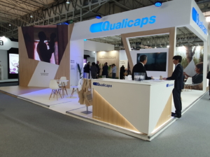 🥇 Custom exhibition stand for Qualicaps_at_CPHI_2023, produced by ProjeKta stand builders with innovative branding and structure.