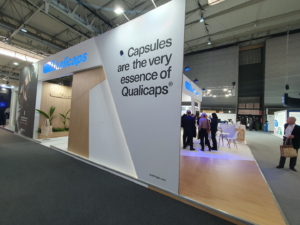 🥇 Custom exhibition stand for Qualicaps_at_CPHI_2023, produced by ProjeKta stand builders with innovative branding and structure.