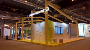 🥇 Custom exhibition stand for Sanofi_Genzyme, produced by ProjeKta stand builders with innovative branding and structure.
