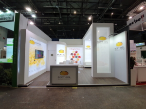 🥇 Custom exhibition stand for SoftGel_Technologies_Inc_at_Vitafoods_Geneva, produced by ProjeKta stand builders with innovative branding and structure.