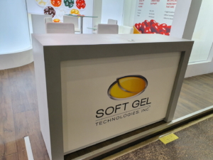 🥇 Custom exhibition stand for SoftGel_Technologies_Inc_at_Vitafoods_Geneva, produced by ProjeKta stand builders with innovative branding and structure.