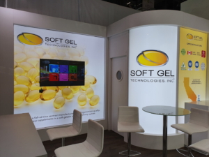 🥇 Custom exhibition stand for SoftGel_Technologies_Inc_at_Vitafoods_Geneva, produced by ProjeKta stand builders with innovative branding and structure.