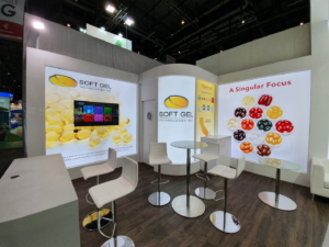 🥇 Custom exhibition stand for SoftGel_Technologies_Inc_at_Vitafoods_Geneva, produced by ProjeKta stand builders with innovative branding and structure.